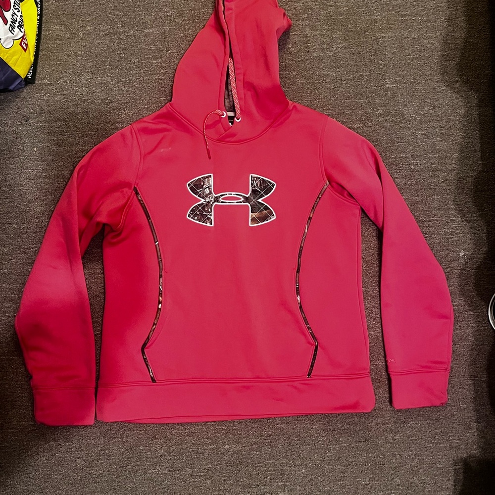 Women’s Under Armour pink hoodie with camo accents